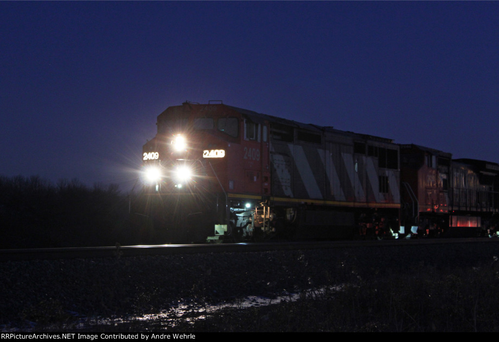 CN 2409 has just met two and is about to get a signal and proceed north off the siding